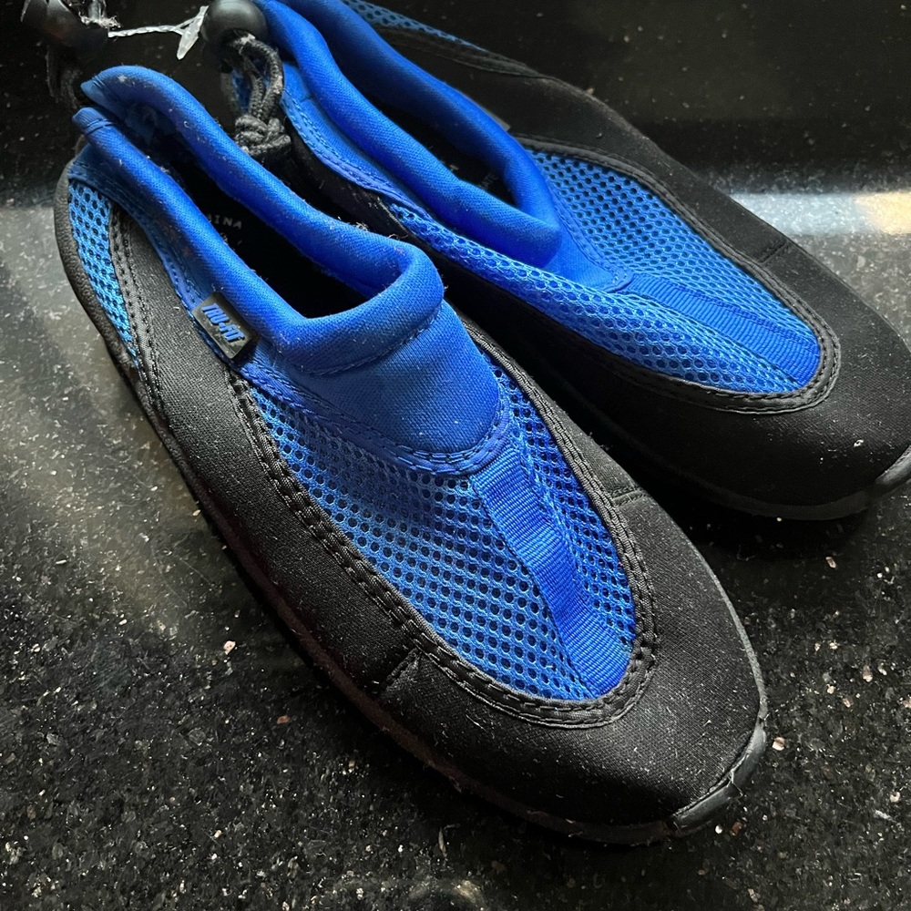 Big kid water shoes.  Never worn!  Get ready for summer fun!!